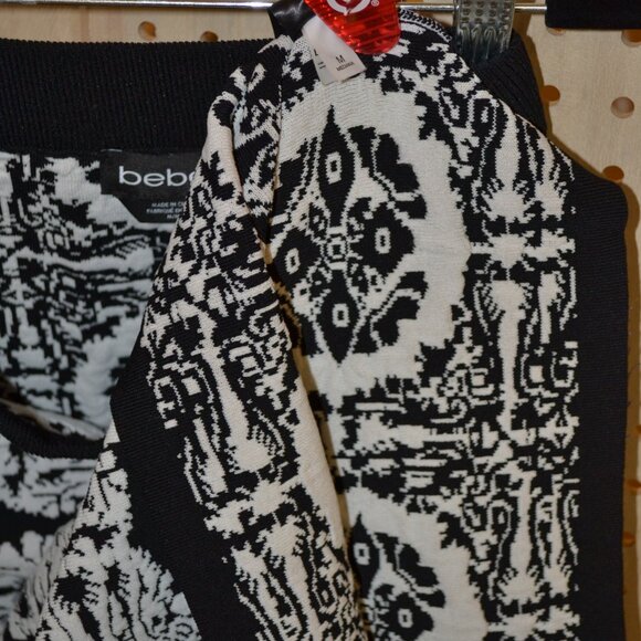 " BEBE " BLACK AND WHITE FLEXIBLE SKIRT SIZE M - Picture 6 of 7